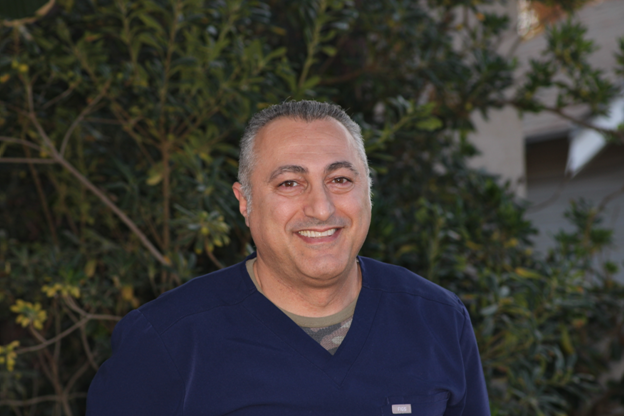 Dr. Karmell Rafisolyman